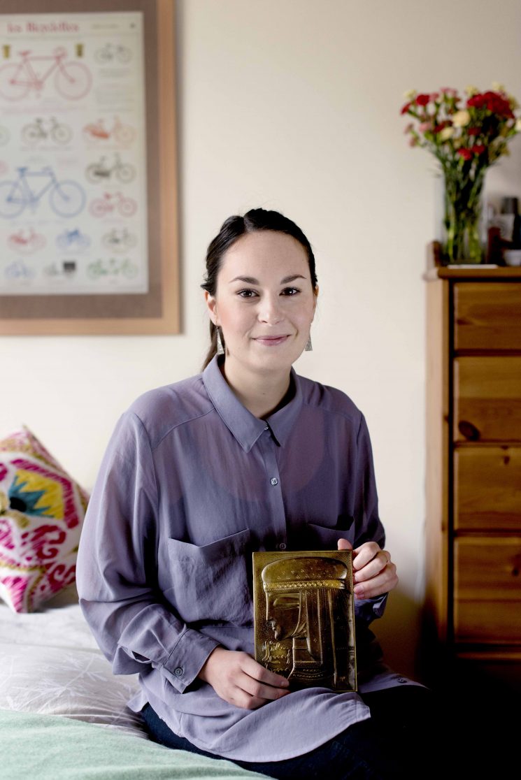 Sasha holding her Keepsake, a plate from Georgia